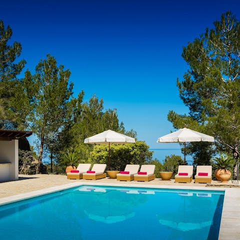 Take a dip in the pool or sprawl out in the sun on the chairs