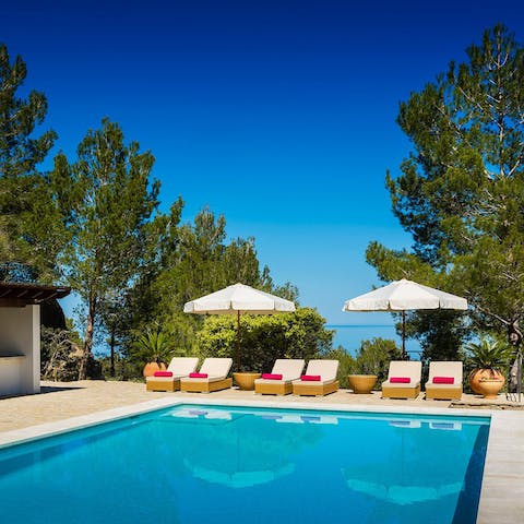 Take a dip in the pool or sprawl out in the sun on the chairs