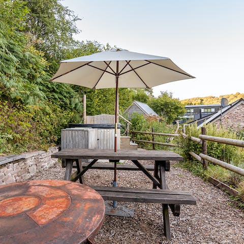 Dine alfresco at the picnic bench on sunny days
