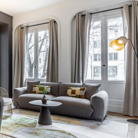 Relax in the light-filled living space after a day seeing the sights