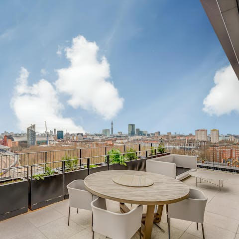 Admire city views as you relax on the shared roof terrace