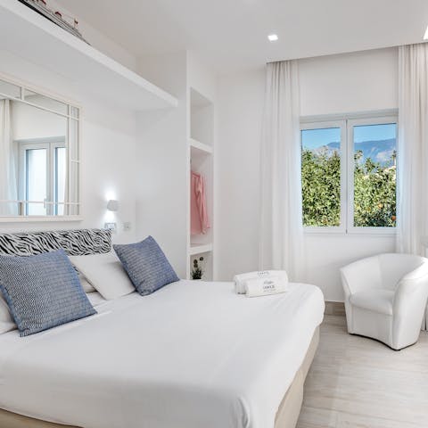 Wake up to views of lemon trees and distant mountains