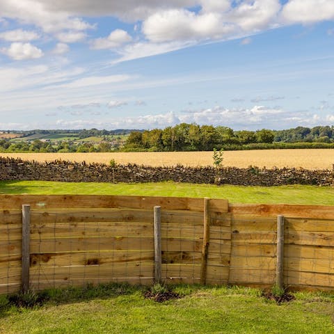 Enjoy a glass of wine next to the fire pit on summer evenings