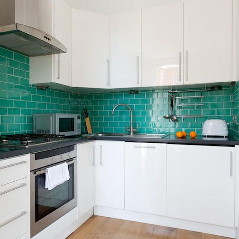 Cook a meal in the well equipped kitchen