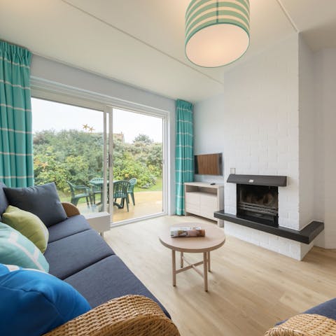Settle in for a cosy evening by the open-hearth fireplace