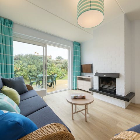Settle in for a cosy evening by the open-hearth fireplace