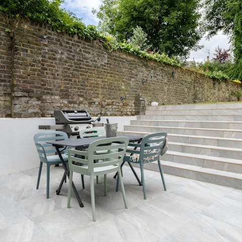Enjoy a glass of wine on the sunny patio