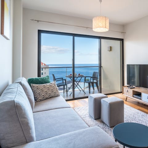 Enjoy an evening of movies and Madeira wine in the comfy living area