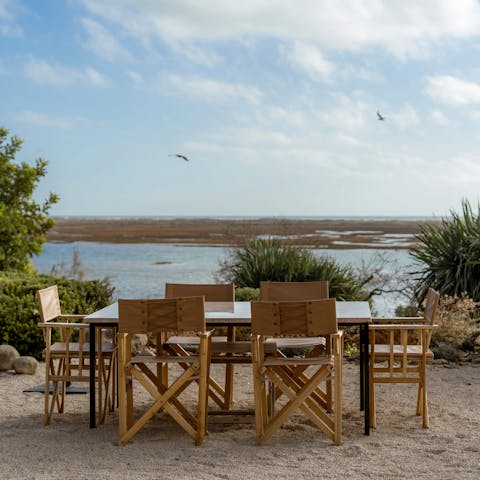 Dine alfresco at the table overlooking the Ria Formosa