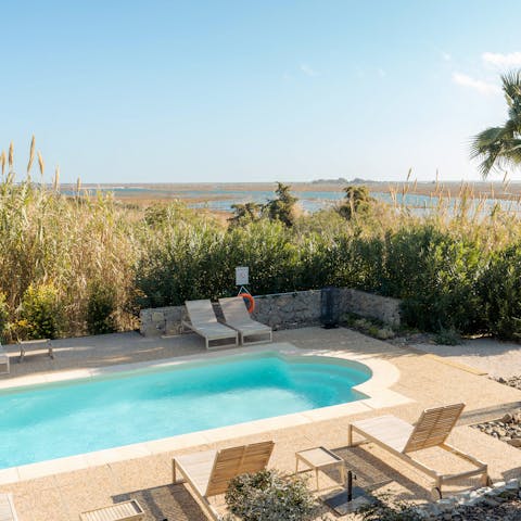 Slip between the private pool and the sun lounger