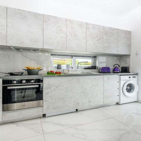 Rustle up a tasty Cypriot breakfast of mpoukkoma in this grey-toned kitchen