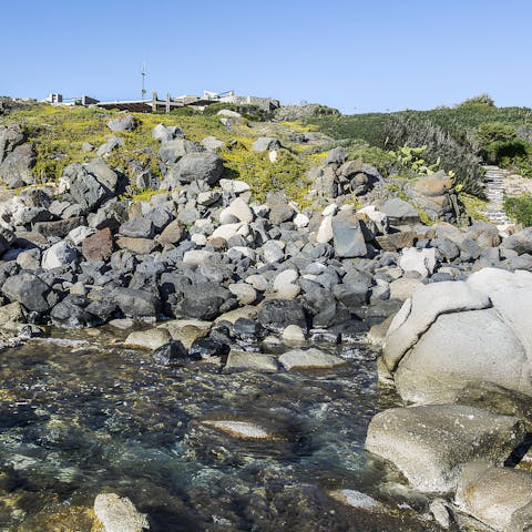 Follow the stone steps from the villa to the crystal-clear Mediterranean