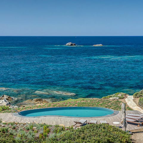 Take a morning dip with the turquoise sea as your backdrop
