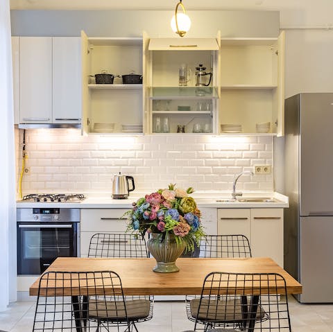 Gather around the chic dining table for relaxed dinners at home