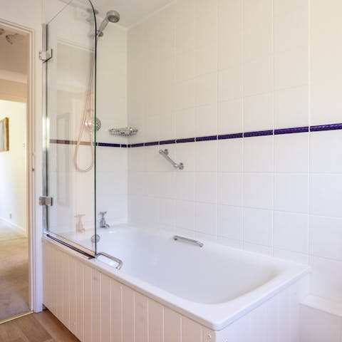 Refresh under the power shower or run yourself a calming bath after a ramble in the East Sussex countryside