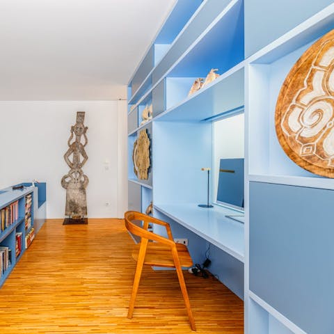 Catch up on emails from the open-plan desk space