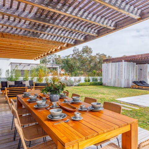 Gather under the pergola for a Portuguese feast alfresco