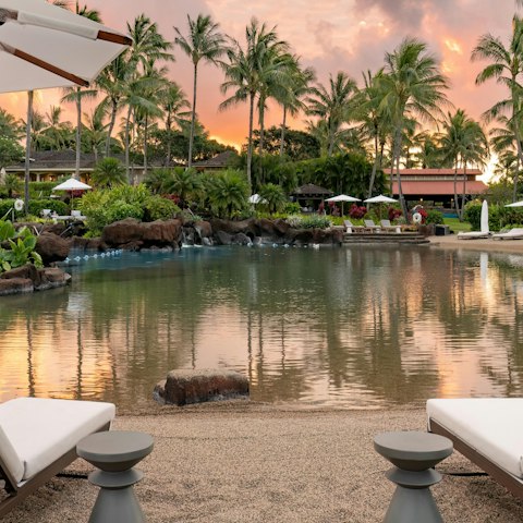 Lounge by one of the resort swimming pools