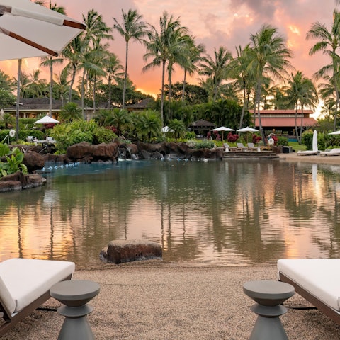Lounge by one of the resort swimming pools