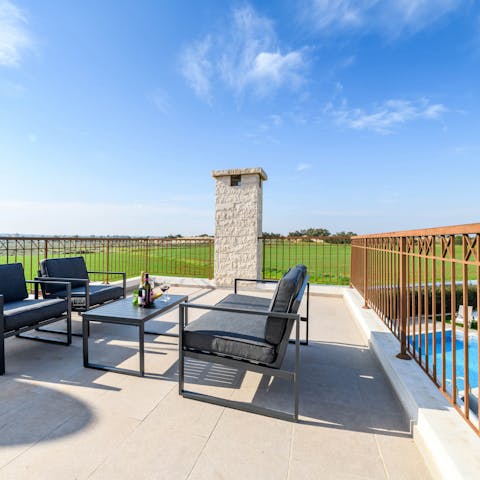 Toast the day's end with sundowners on the private rooftop terrace