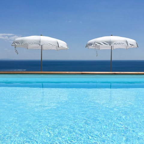 Admire the sea views from the cooling infinity pool