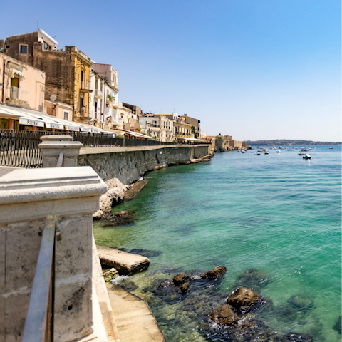 Explore the vibrant heart of Ortigia, including the Duomo, a short stroll away