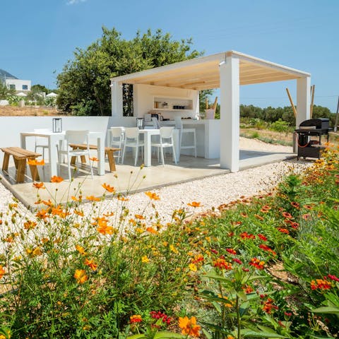 Fire up the barbecue for dinner beneath the stars in the outdoor kitchen