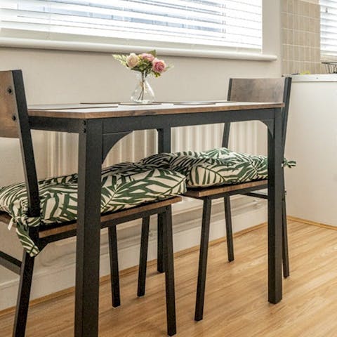 Enjoy a coffee and plan out the day at the dining table