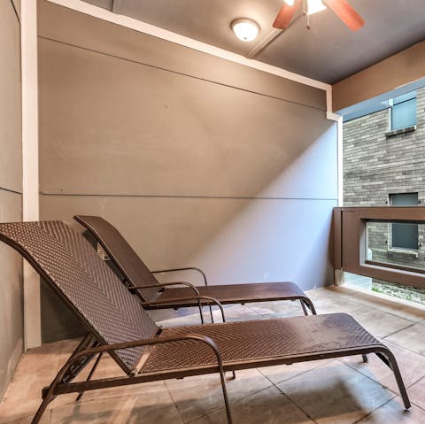 Relax on the secluded balcony between exploring New Orleans