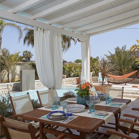Enjoy long lunches under the stylish pergola