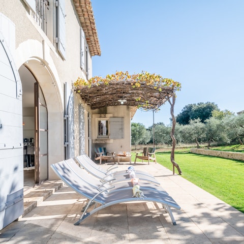 Find a sunny spot to recline with a book and an ice-cold drink