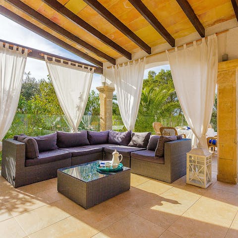 Enjoy an iced coffee and a snack on the covered terrace