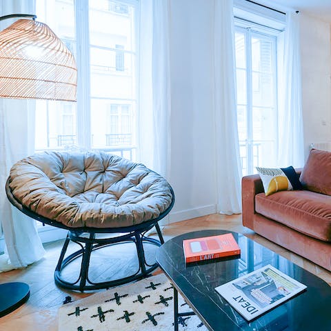 Get comfortable in the living room and leaf through the coffee table books