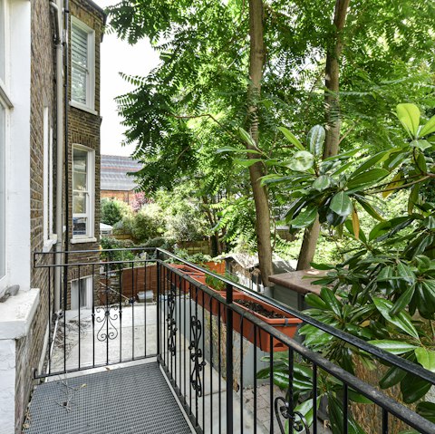 Sip your morning coffee on the balcony and watch the birds flit through the trees