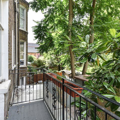 Sip your morning coffee on the balcony and watch the birds flit through the trees