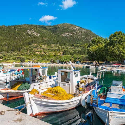 Stroll down the private path to Polis Beach and take a boat out for the day