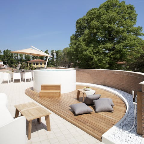 Luxuriate in the Jacuzzi on the terrace after a busy day of sightseeing