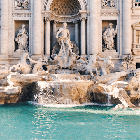 Admire the Trevi Fountain, a twenty-minute drive away