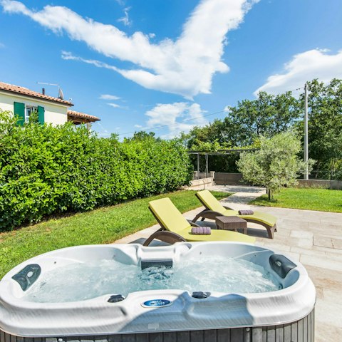 Enjoy a glass of Croatian wine in the hot tub