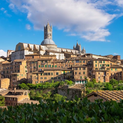 Take a day trip to Siena – it's a short drive away