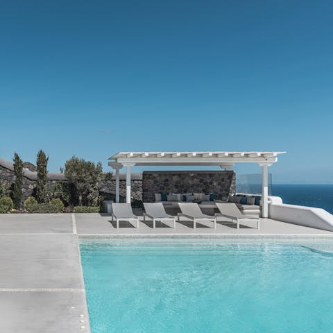 Slip into the infinity pool overlooking the ocean