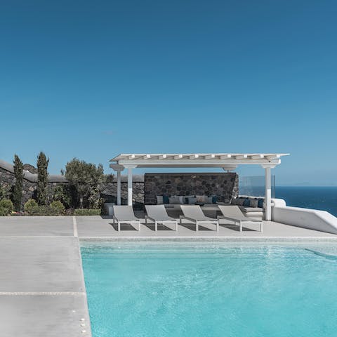 Slip into the infinity pool overlooking the ocean