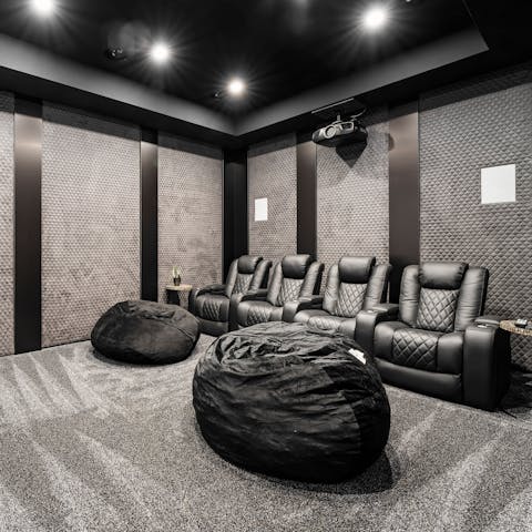 Watch your favourite Hollywood films in the plush home cinema room