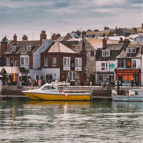 Explore Weymouth, including its charming harbour, a short walk away