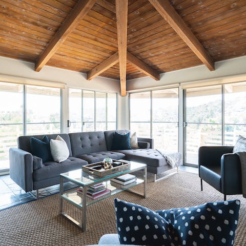 Enjoy taking in all angles of the Hollywood hills from the comfort of the sofa