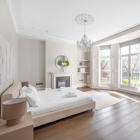 Enjoy breakfast in bed with a view of the leafy communal gardens