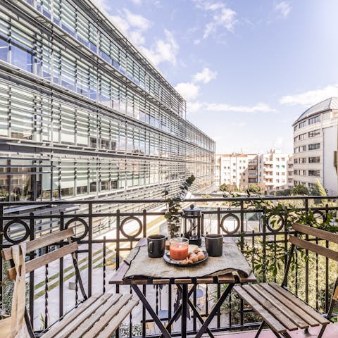 Sip your morning coffee on the balcony while you plan your day in Madrid