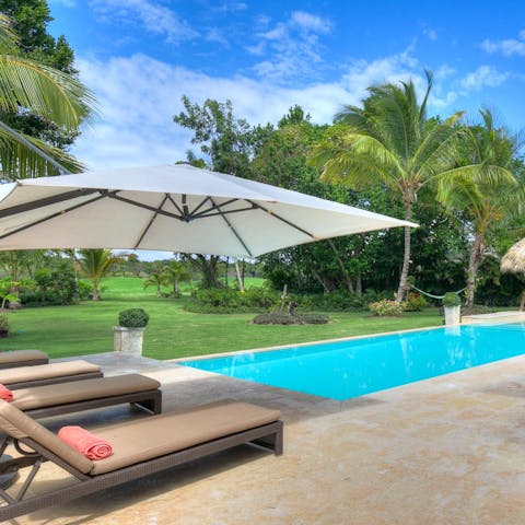 Soak up the sun from the loungers around the private pool