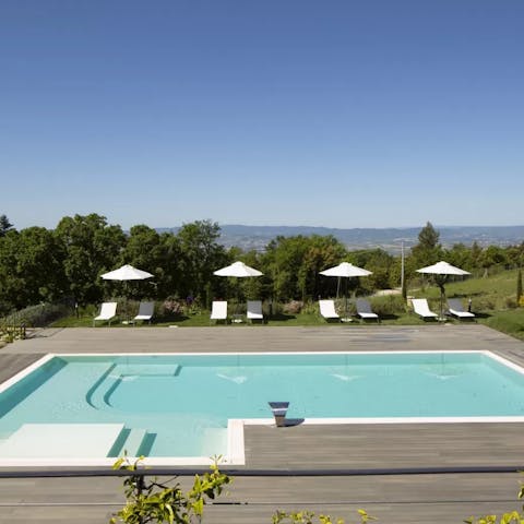 Alternate between sunbathing and swimming in the private pool