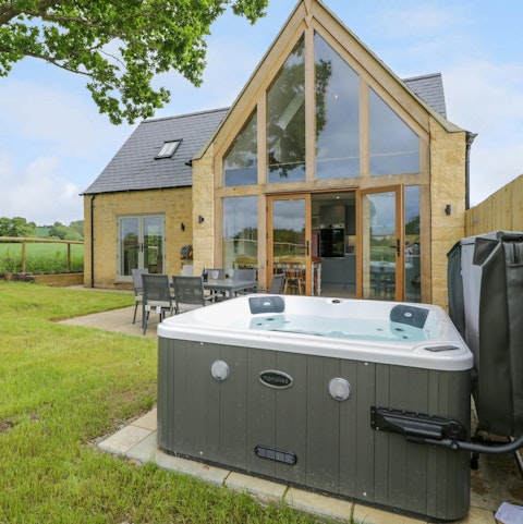 Relax in the Gloucestershire sun in the hot tub